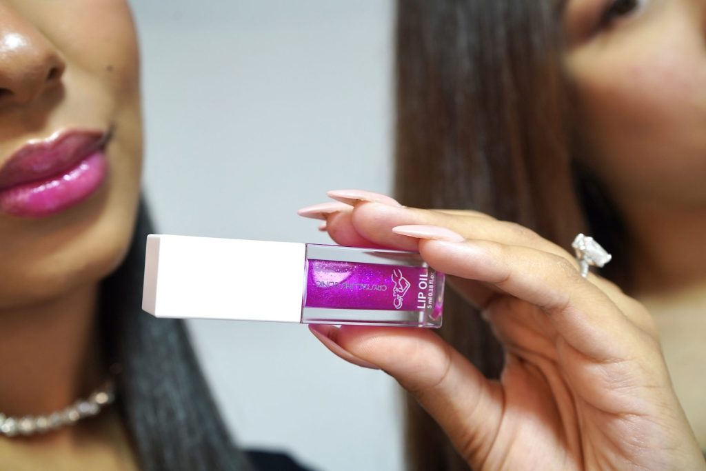 Lip Care Routine with Lip Oils: Hydrate, Nourish, and Shine! Photo - Two beautiful women with perfectlips holding our Hydrate & Shine CC Lip Oil