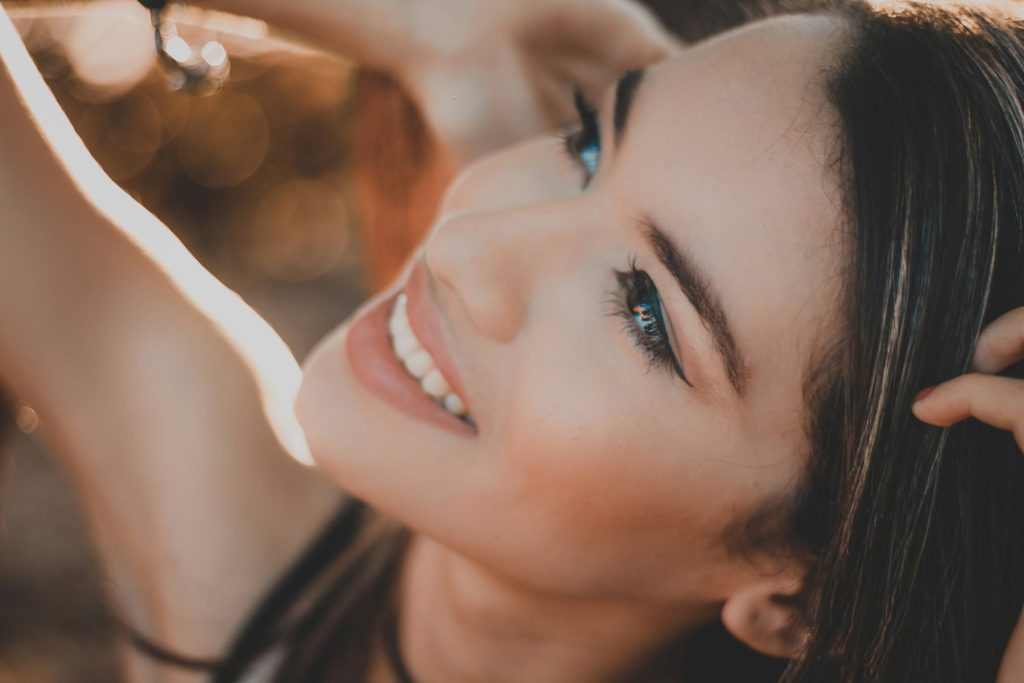 no 1 way to Strengthen from Within: How Immune-Boosting IV Therapy Shields You This Flu Season Photo - a woman looking happy and healthy after getting Immune-Boosting IV Therapy