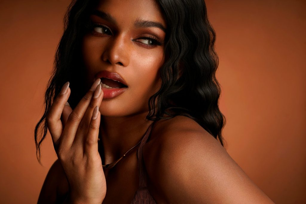 Skin Boosters vs PRP: Which is Right for You? A beautiful woman with flawless skin after choosing between Skin Boosters vs PRP and having one of those treatments.
