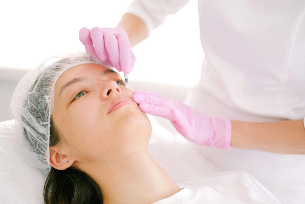Botox for Teeth Grinding: A Gentle, Effective Solution at Crystalline Clinic Photo - A woman getting Botox for teeth grinding